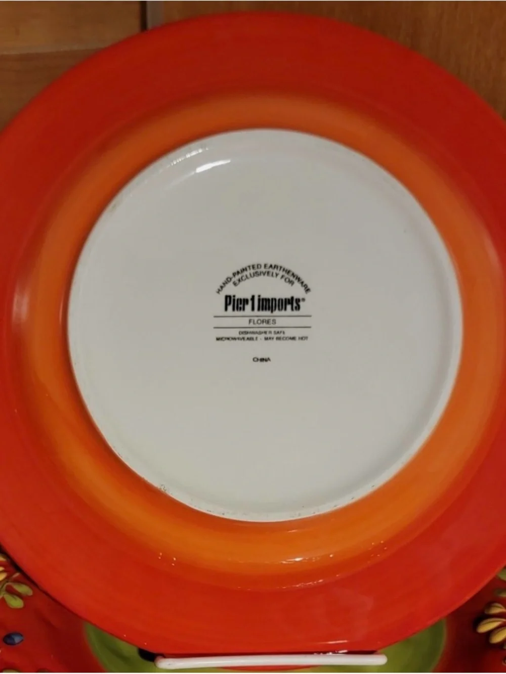 Two Pier 1 Flores Orange and green set of 2 Dinner Plates